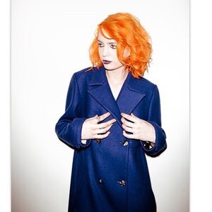 Royal blue maxi wool coat w/ polka dot lining.